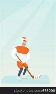 Young caucasian ice hockey player skating on the ice rink with a stick. Full length of smiling sportsman in uniform playing ice hockey. Vector flat design illustration. Vertical layout.. Young caucasian ice hockey player.