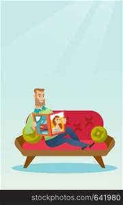Young caucasian man reading a magazine. Man sitting on the couch and reading a magazine. Hipster man sitting on the couch with a magazine in hands. Vector flat design illustration. Vertical layout.. Man reading a magazine on the couch.