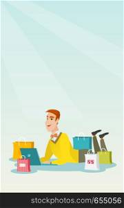 Young caucasian man using a laptop for online shopping. Smiling man lying with a laptop and shopping bags around him. Happy man doing online shopping. Vector flat design illustration. Vertical layout.. Young caucasian man doing online shopping.