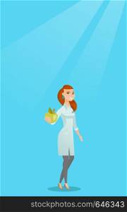 Young caucasian nutritionist prescribing diet and healthy eating. Smiling confident nutritionist holding an apple. Nutritionist offering fresh apple. Vector flat design illustration. Vertical layout.. Nutritionist offering fresh apple.