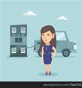 Young caucasian woman charging her electric car at the charging station. Happy smiling woman standing near power supply for charging of electric car. Vector cartoon illustration. Square layout.. Woman charging electric car at charging station.