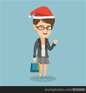 Young caucasian woman in santa hat holding shopping bags with christmas gifts and giving thumb up. Cheerful smiling woman shopping for christmas gifts. Vector cartoon illustration. Square layout.. Woman in santa hat shopping for christmas gifts.