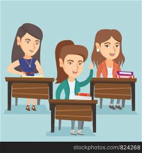 Young female caucasian student raising her hand for an answer in the classroom. Happy smart student sitting at the desk with raised hand at the lesson. Vector cartoon illustration. Square layout.. Young student raising her hand for an answer.