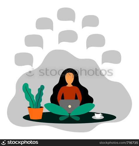 Young freelancer woman using laptop computer sitting on the floor. Concept of working at home. Young female blogger.