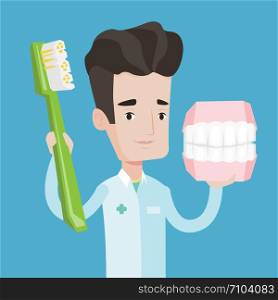Young friendly dentist holding dental jaw model and a toothbrush in hands. Male dentist showing dental jaw model and toothbrush. Vector flat design illustration. Square layout.. Dentist with dental jaw model and toothbrush.