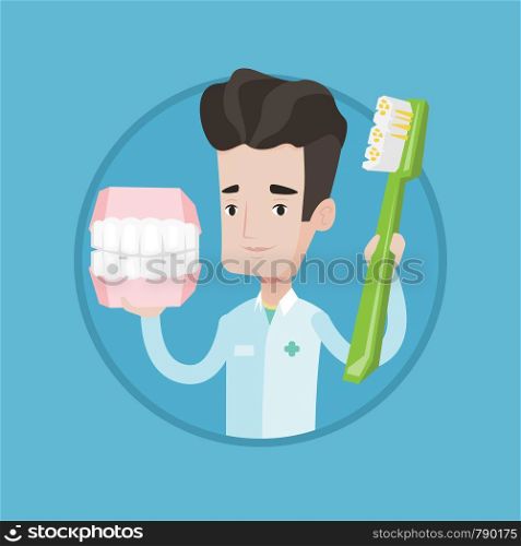 Young friendly dentist holding dental jaw model and a toothbrush in hands. Male dentist showing dental jaw model and toothbrush. Vector flat design illustration in the circle isolated on background.. Dentist with dental jaw model and toothbrush.