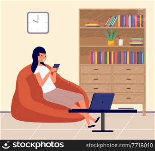 Young girl looking at mobile phone and checking social networks sitting in cozy armchair in livingroom. Businesswoman has virtual communication using laptop. Woman freelancer works from home. Young girl looking at mobile phone and checking social networks sitting in armchair in livingroom