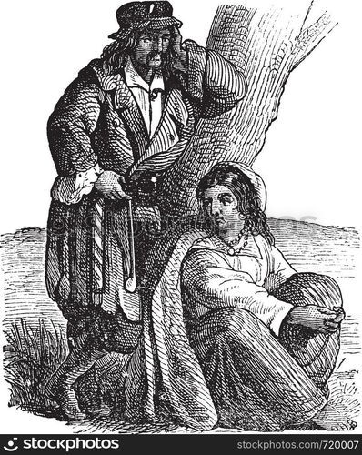 Young gypsy couple by tree vintage engraving. Old engraved illustration of gypsy couple, woman sitting while man leaning on tree.