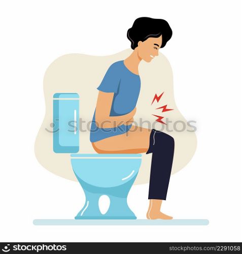 Young man is sitting on toilet. Problems with constipation and digestion.