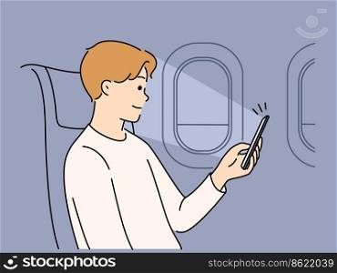 Young man sit on plane using cellphone gadget. Smiling male browse smartphone on flight. Technology and flying. Vector illustration. . Man using cellphone on plane 