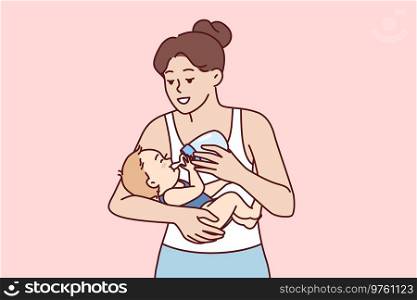 Young mother feeds infant from bottle using artificial baby food fortified with vitamins due to disease hypogalactia. Happy mom takes care of son or daughter and gives baby milk from pacifier. Young mother feeds infant from bottle using artificial baby food due to disease hypogalactia