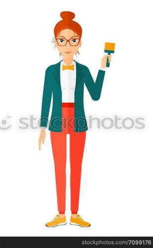 Young painter holding a paint brush vector flat design illustration isolated on white background. Vertical layout.. Painter with paint brush.