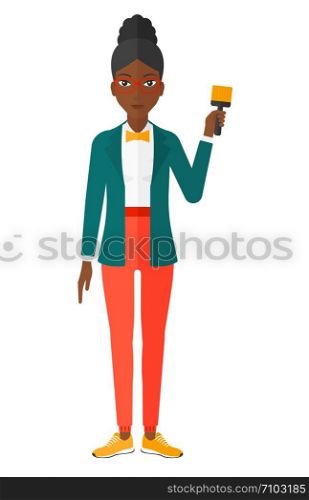 Young painter holding a paint brush vector flat design illustration isolated on white background. . Painter with paint brush.