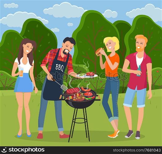 Young people having picnic in countryside. Man in BBQ apron grilling barbecue. Plate with meat. Girl has hamburger, female drinks cola, bearded red-haired man drinks beer or water. Green landscape. Rest in countryside, people grill barbecue. Men and women rest and eat. Summertime, green landscape