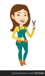 Young repairman standing with a spanner in hand. Caucasian female repairman giving thumb up. Female repairman in overalls holding spanner. Vector flat design illustration isolated on white background.. Repairman holding spanner vector illustration.