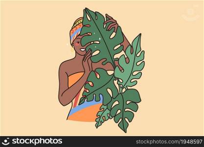 Young smiling African American woman in traditional clothes and turban. Happy black girl with scarf on head look behind leaves trees. Ethnicity and diversity concept. Flat vector illustration.. Smiling African American woman in traditional Africa clothes