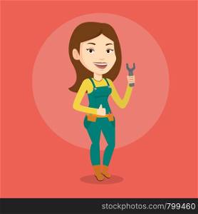 Young smiling repairman standing with a spanner in hand. Caucasian female repairman giving thumb up. Female repairman in overalls holding a spanner. Vector flat design illustration. Square layout.. Repairman holding spanner vector illustration.