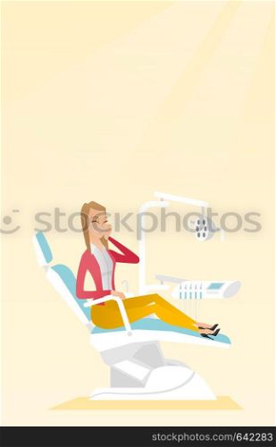 Young upset caucasian patient visiting dentist because of toothache. Sad patient suffering from toothache. Sorrowful woman having a strong toothache. Vector flat design illustration. Vertical layout.. Woman suffering from toothache.