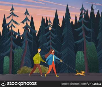 Young woman and man holding each other s hand, walking together outdoor with small dog along the forest road in the evening. Romantic pastime concept, family weekend and walks with pet in autumn park. Young woman and man holding each other s hand, walking outdoor with dog along the forest road