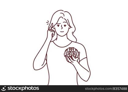 Young woman holding brain hands show at head. Focused female ask to use brain and think and consider more. Vector illustration.. Young woman hold brain pint at head