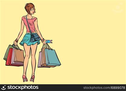Young woman with shopping bags on sale. Pop art retro vector illustration. Young woman with shopping bags on sale