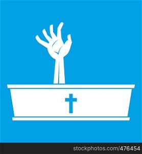 Zombie hand coming out of his coffin icon white isolated on blue background vector illustration. Zombie hand coming out of his coffin icon white